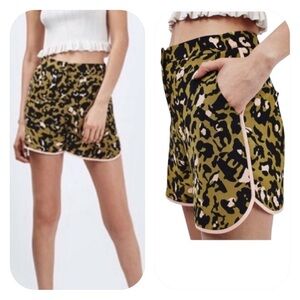 Topshop size 4 black green & pink dolphin hem short
